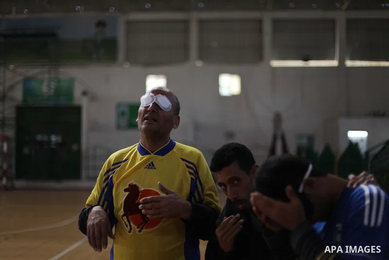 Palestinian blind goalball players compete during a training course, in Gaza city on Feb. 18, 2014. Photo by Ashraf Amra