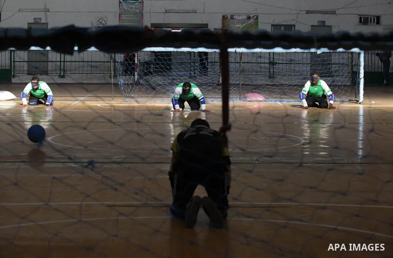 Palestinian blind goalball players compete during a training course, in Gaza city on Feb. 18, 2014. Photo by Ashraf Amra
