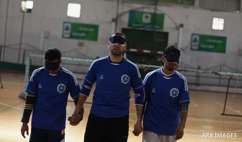 Palestinian blind goalball players compete during a training course, in Gaza city on Feb. 18, 2014. Photo by Ashraf Amra