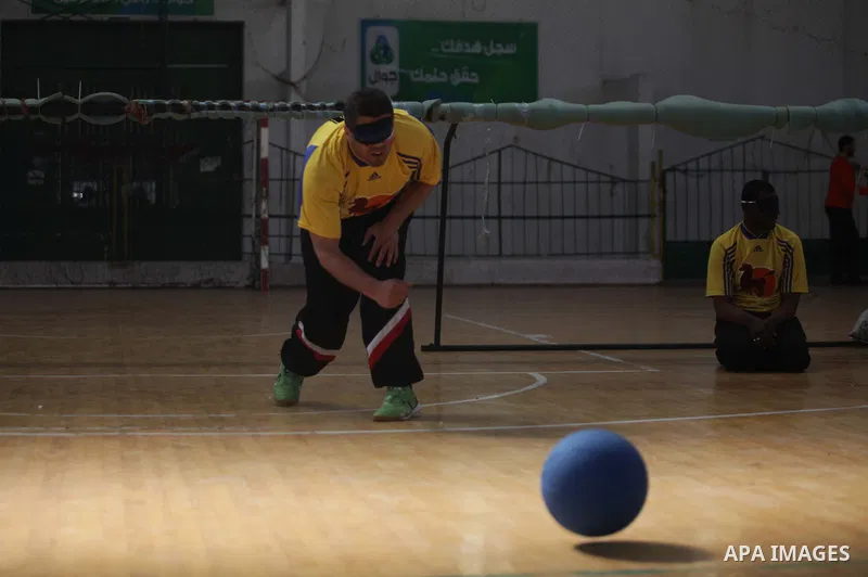 Palestinian blind goalball players compete during a training course, in Gaza city on Feb. 18, 2014. Photo by Ashraf Amra