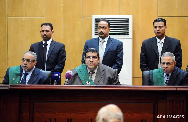 Egyptian judges attend the trial of suspects in the case of the 'Nasr City terrorist cell', in Cairo on February 18, 2014. Cairo Criminal Court of the Supreme State Security postponed Tuesday the trial of 26 suspects in...