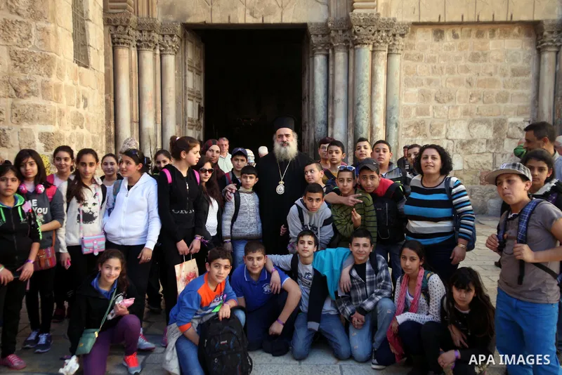 Greek Orthodox Archbishop Atallah Hanna receives Qatari media delegation at the Church of the Holy Sepulchre, in Jerusalem's Old City, February 19, 2014. Photo by Saeed Qaq