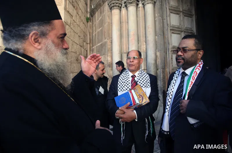 Greek Orthodox Archbishop Atallah Hanna receives Qatari media delegation at the Church of the Holy Sepulchre, in Jerusalem's Old City, February 19, 2014. Photo by Saeed Qaq