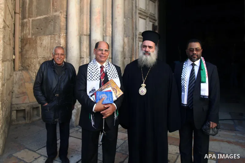 Greek Orthodox Archbishop Atallah Hanna receives Qatari media delegation at the Church of the Holy Sepulchre, in Jerusalem's Old City, February 19, 2014. Photo by Saeed Qaq