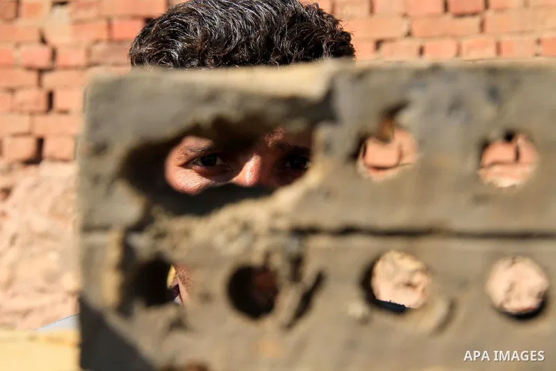 An Egyptian laborer works at a brick factory facility in the suburb of Helwan, Cairo, Egypt on February 19, 2014. Egypt’s unemployment rate remained unchanged in the fourth quarter of 2013 at 13.4 percent of a labour for...