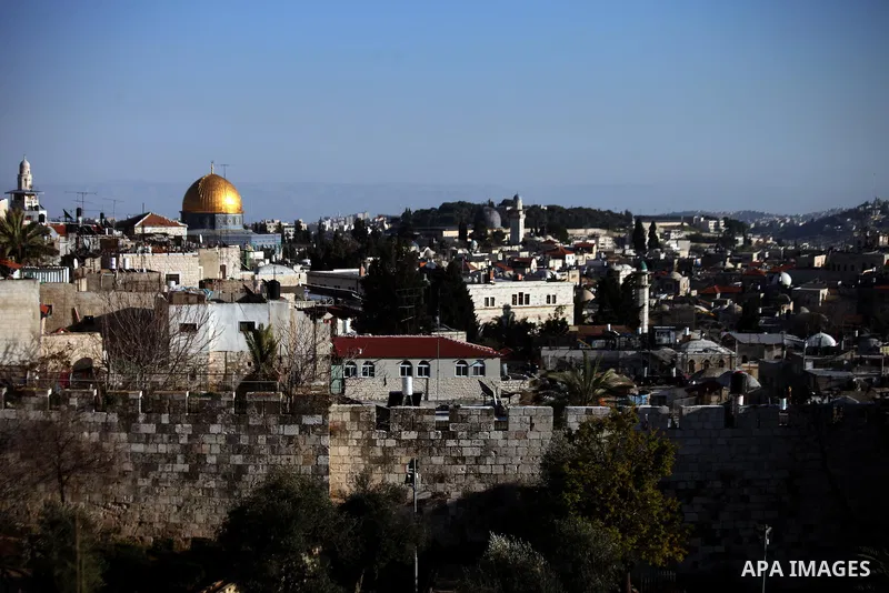 A pictures shows the Dome of the Rock mosque, Islam's third holiest site, in the old city of Jerusalem, on February 20, 2014. Photo by Saeed Qaq