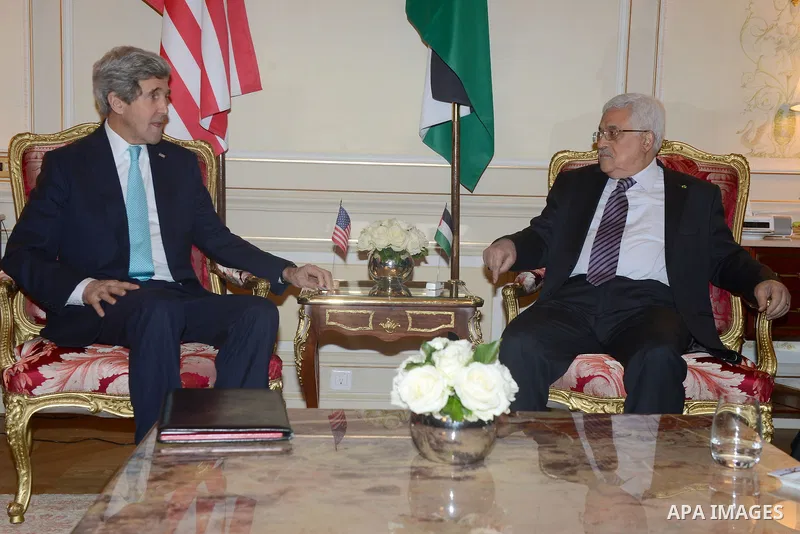 Palestinian President Mahmud Abbas meets with US Secretary of State John Kerry for their second round of talks in two days on February 20, 2014 in Paris. The two men met for two hours with their teams in an upscale Paris...
