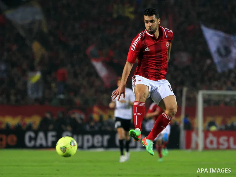 Egyptian players of Al-Ahly club compete with Tunisia's CS Sfaxien during their African Super Cup soccer match at Cairo Stadium February 20, 2014. Photo by Mohammed Bendari