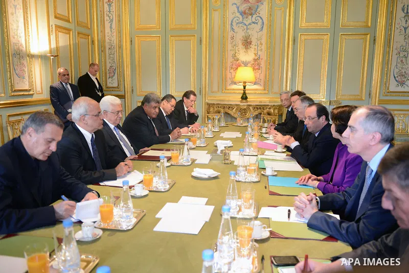 Palestinian President, Mahmoud Abbas (Abu Mazen) meets French President Francois Holland in Paris on Feb. 21, 2014. Photo by Thaer Ganaim