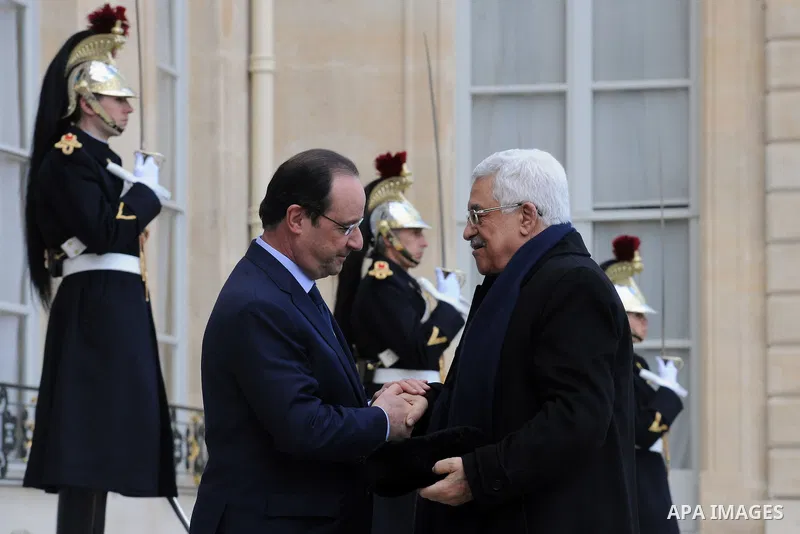 Palestinian President, Mahmoud Abbas (Abu Mazen) meets French President Francois Holland in Paris on Feb. 21, 2014. Photo by Thaer Ganaim