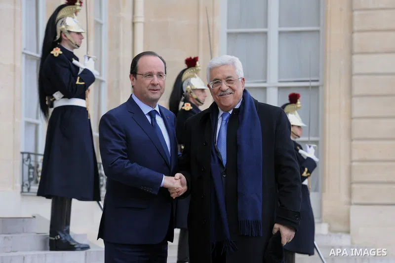 Palestinian President, Mahmoud Abbas (Abu Mazen) meets French President Francois Holland in Paris on Feb. 21, 2014. Photo by Thaer Ganaim