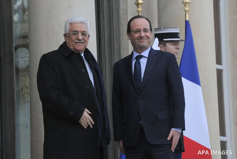 Palestinian President, Mahmoud Abbas (Abu Mazen) meets French President Francois Holland in Paris on Feb. 21, 2014. Photo by Thaer Ganaim