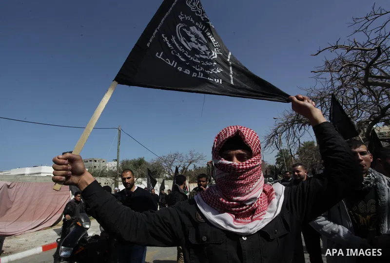 Palestinian supporters of the Popular Resistance Movement take part in a protest in solidarity with Muslims in Central African Republic, in front of the headquarter United Nation "UNSCO" in Gaza city, February 22, 2014....