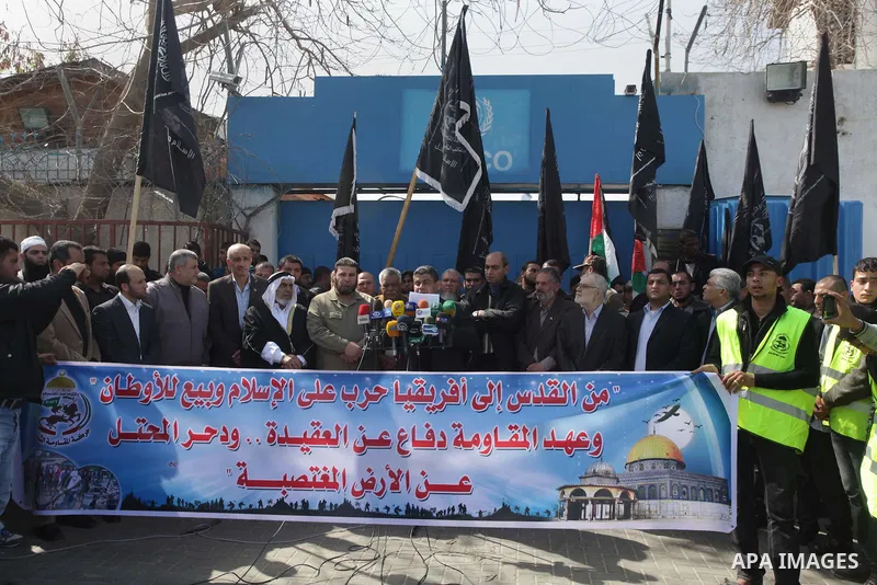 Palestinian supporters of the Popular Resistance Movement take part in a protest in solidarity with Muslims in Central African Republic, in front of the headquarter United Nation "UNSCO" in Gaza city, February 22, 2014....