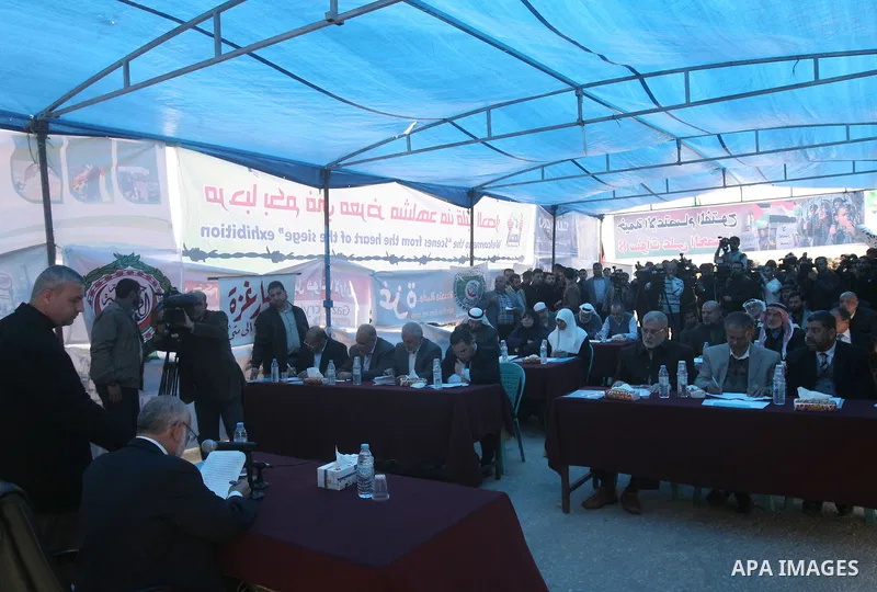 Ahmad Bahar, deputy parliament speaker and Hamas member, speaks during a special session, attended by Hamas MPs, in a tent at Rafah on February 23, 2014, to demand that Egypt lift border crossing restrictions. Egypt impo...
