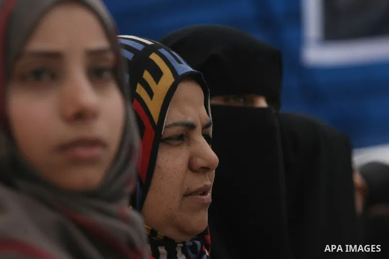 Palestinians gather during a protest in front of the Rafah border crossing with Egypt in the southern Gaza Strip on February 24, 2014, to demand that Egypt lift border crossing restrictions. Egypt imposed the restriction...