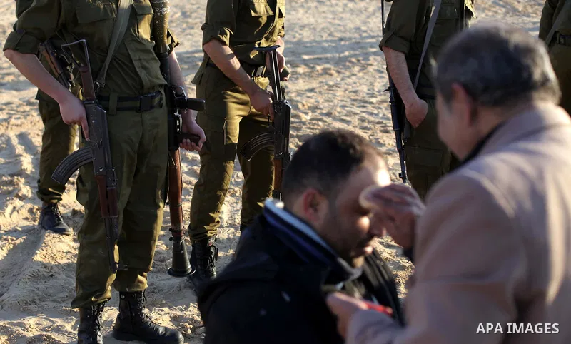 A photo taken on Feb. 17, 2014 shows A Palestinian actor has makeup applied by assistant takes during filming in a movie being made in Gaza called, ''Losing Shalit," in Gaza City. "Losing Schalit," currently being filmed...
