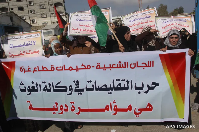Palestinians take part a protest against the UNRWA decision to reduce of the food aid in front of the headquarters United Nations Relief and Works Agency (UNRWA) in Gaza city, on Feb. 25, 2014. Photo by Mohammed Asad