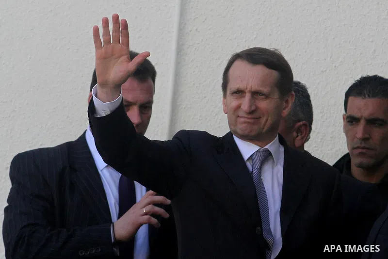 Sergei Naryshkin , Speaker of the Russian State Duma, is welcomed by an unidentified official as he arrives to the West Bank town of Ramallah, 26 February 2014, for a meeting with Palestinian President Mahmoud Abbas. Oth...