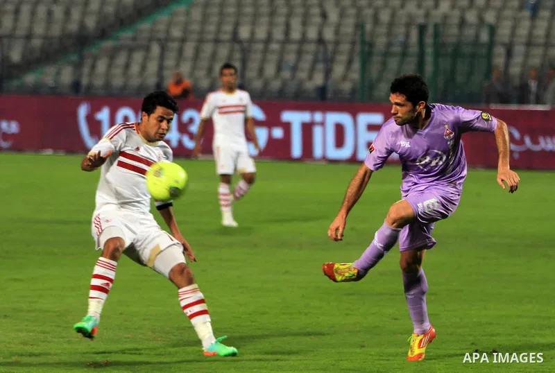 Egyptian players of al-zamalek club compete with kabuscorp sport club during their African Cup soccer match at the sports flowers club's headquarters in Cairo, capital of Egypt, on March 1, 2014. Photo by Mohammed Bendar...