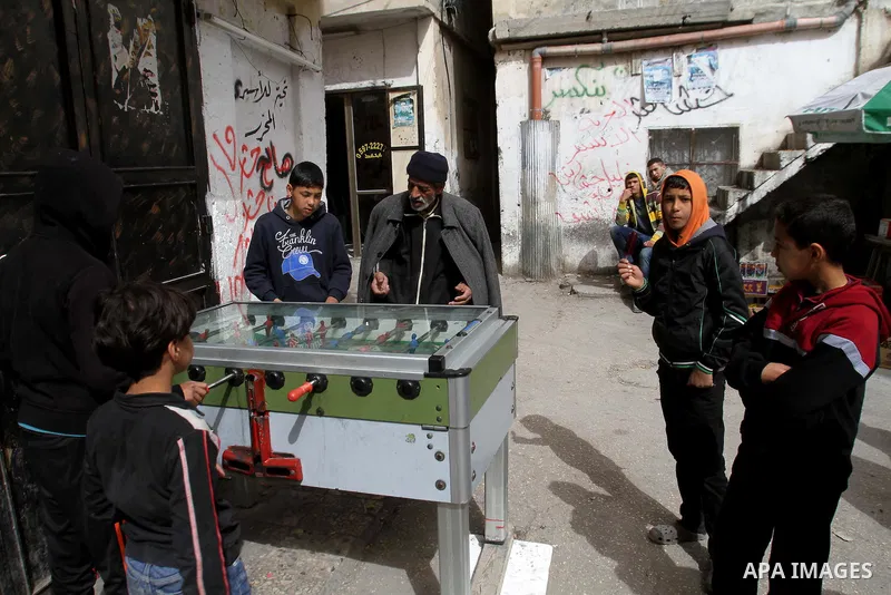 Palestinian children play outside their family's house at Balata refugee camp, near the West Bank City of Nablus, March 04, 2014. Photo by Nedal Eshtayah