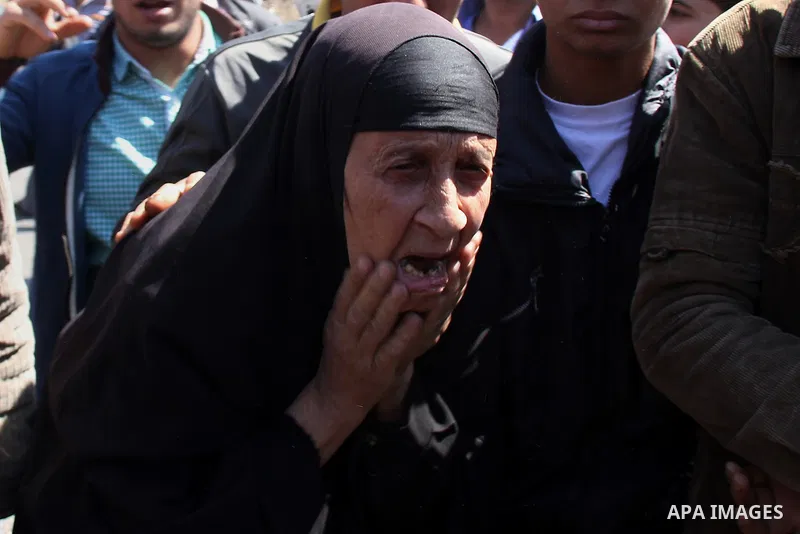 Egyptian relatives of gunmen soldiers take part a protest at the checkpoint where an attack happened in the Shubra Al-Kheima neighborhood, the outskirt of northern Cairo, Egypt, on March 15, 2014. At least six Egyptian s...