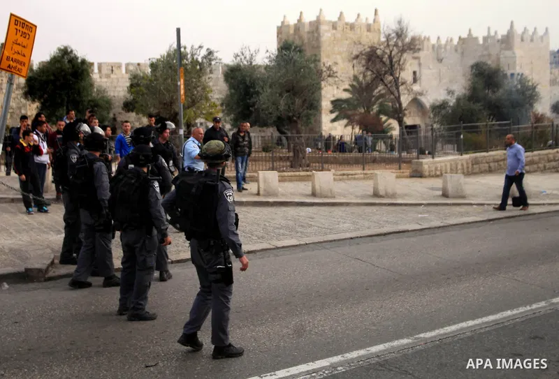 Israeli riot police stand guard during a demonstration in Jerusalem's Old City, 16 March 2014, when Palestinians were prevented from entering al-Aqsa Mosque for prayers. Earlier in the day protests took place inside the...