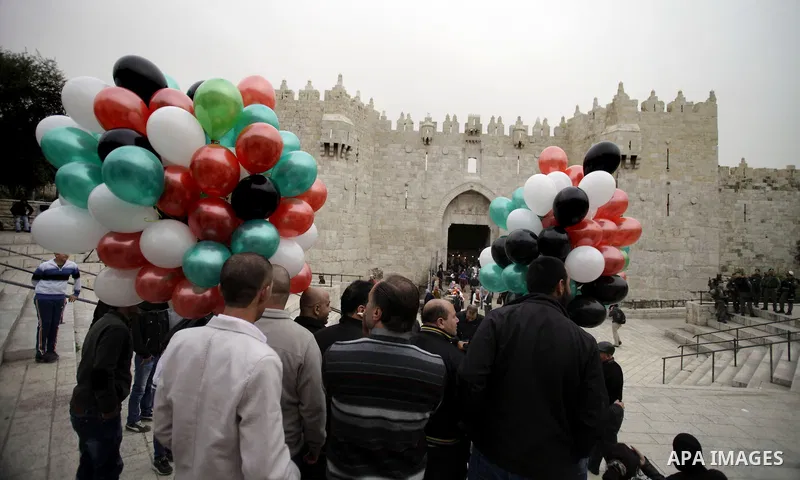Palestinians take part in a rally in Jerusalem's Old City on March 17, 2014, to show their support for Palestinian president Mahmud Abbas who is on an official visit to the US capital, Washington DC. President Barack Oba...