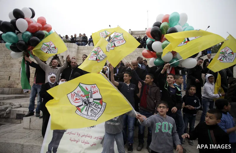Palestinians take part in a rally in Jerusalem's Old City on March 17, 2014, to show their support for Palestinian president Mahmud Abbas who is on an official visit to the US capital, Washington DC. President Barack Oba...