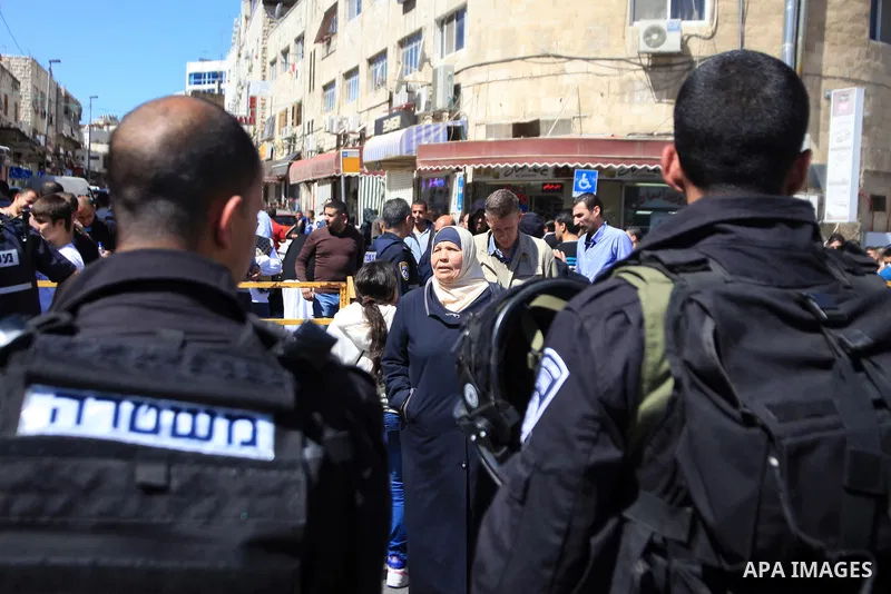 Palestinian Muslims pray outside of the Old City of Jerusalem as Israeli police block them from praying in the city's Al-Aqsa mosque, in the Ras Al-Amud neighborhood of East Jerusalem on 21 March 2014. Israel restricted...