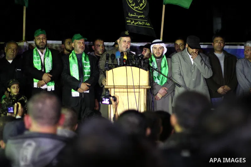 Palestinian supporters of Hamas and Jihad Islamic movements chant slogans during a protest in Gaza City on March 22, 2014 against the killing of three Palestinians were killed in Jenin refugee camp in the West Bank durin...