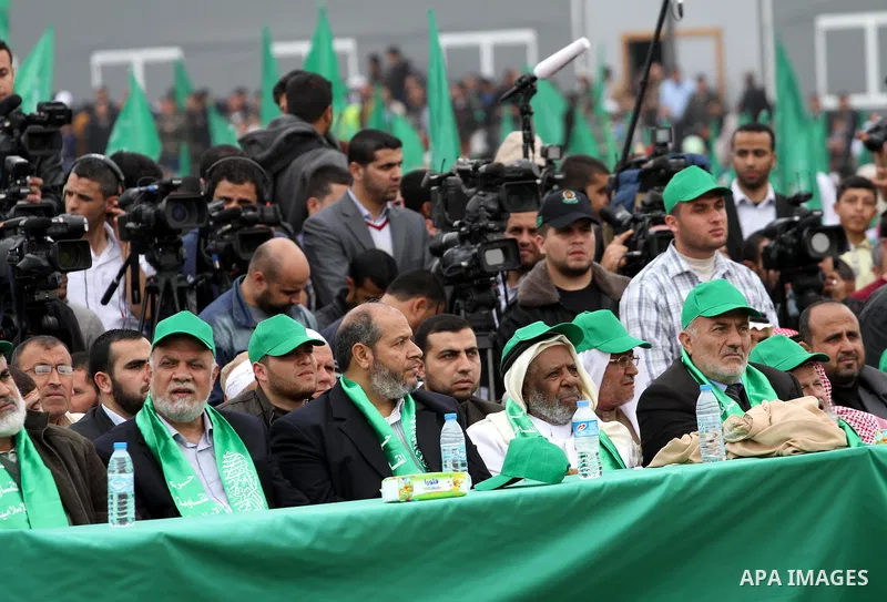 Palestinian Hamas supporters take part in a Hamas rally marking the anniversary of the death of its leaders killed by Israel, in Gaza City March 23, 2014. Photo by Mohammed Asad