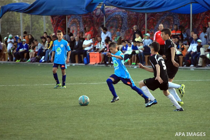Palestinian Local players play with wahdat sport club from Jordan during their match, at Jerusalem city, on March 29, 2014. Palestinian Sakhnin players win in the International Cup of Jerusalem. Photo by Saeed Qaq