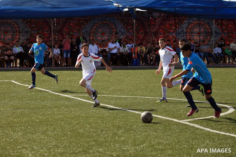 Palestinian Local players play with wahdat sport club from Jordan during their match, at Jerusalem city, on March 29, 2014. Palestinian Sakhnin players win in the International Cup of Jerusalem. Photo by Saeed Qaq