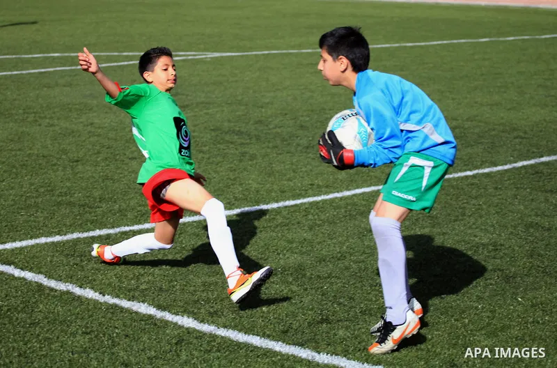 Palestinian Local players play with wahdat sport club from Jordan during their match, at Jerusalem city, on March 29, 2014. Palestinian Sakhnin players win in the International Cup of Jerusalem. Photo by Saeed Qaq