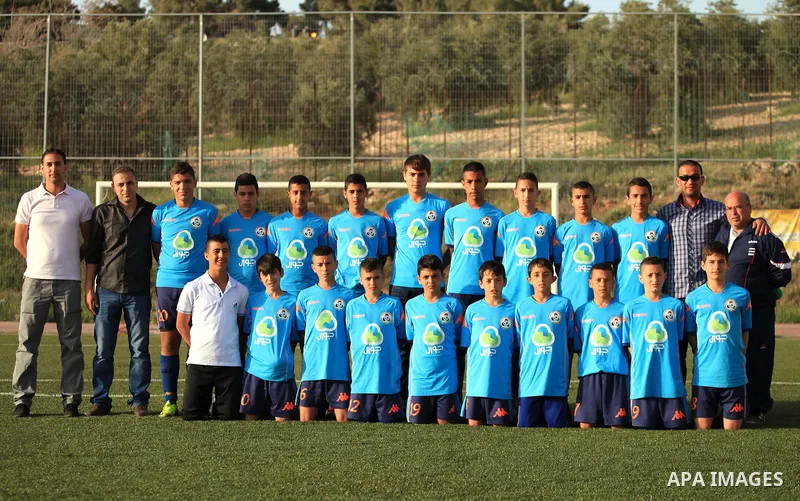 Palestinian Local players play with wahdat sport club from Jordan during their match, at Jerusalem city, on March 29, 2014. Palestinian Sakhnin players win in the International Cup of Jerusalem. Photo by Saeed Qaq