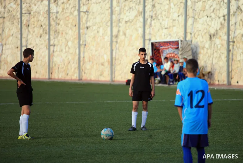 Palestinian Local players play with wahdat sport club from Jordan during their match, at Jerusalem city, on March 29, 2014. Palestinian Sakhnin players win in the International Cup of Jerusalem. Photo by Saeed Qaq