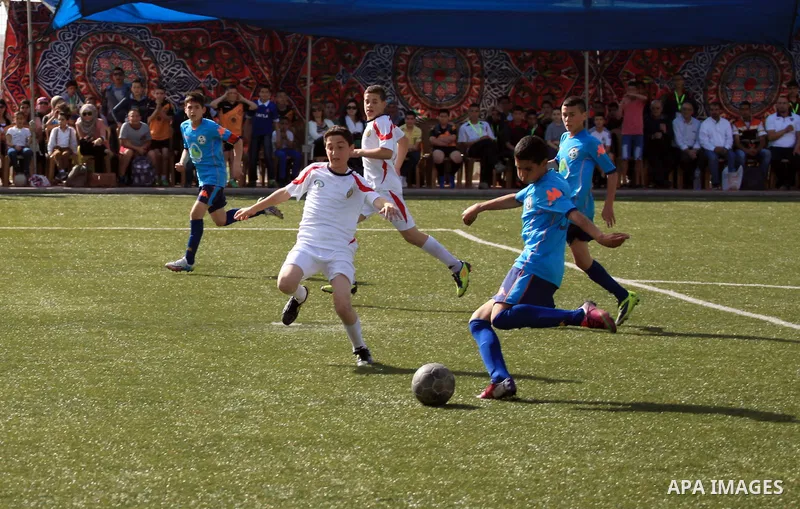 Palestinian Local players play with wahdat sport club from Jordan during their match, at Jerusalem city, on March 29, 2014. Palestinian Sakhnin players win in the International Cup of Jerusalem. Photo by Saeed Qaq