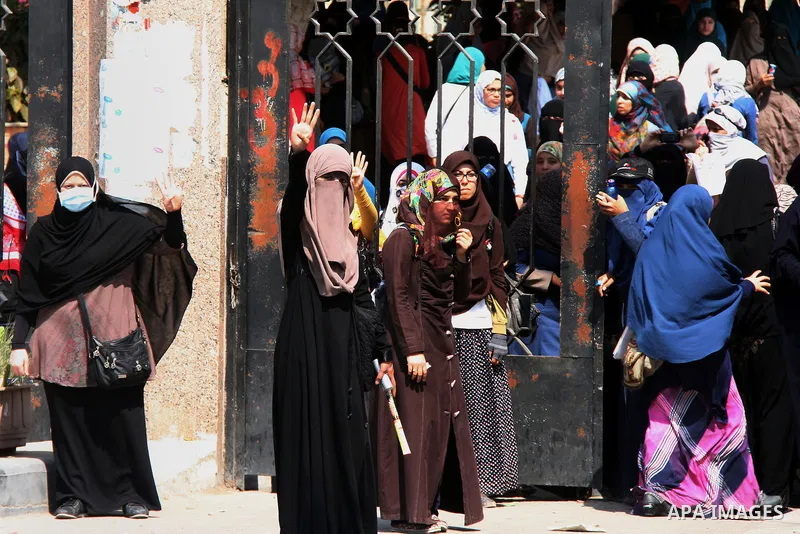 Egyptian students of Al-Azhar University and supporters of the Muslim Brotherhood and deposed President Mohamed Mursi protest at the university's campus in Cairo's Nasr City district March 30, 2014. The Muslim Brotherhoo...