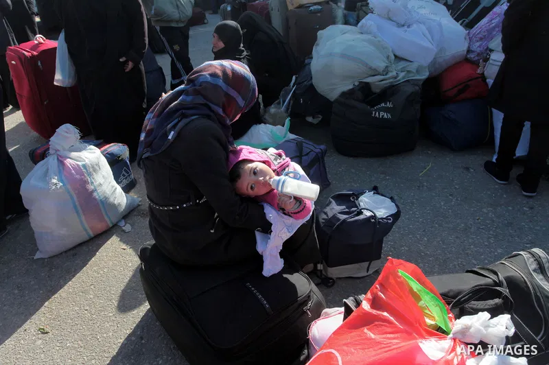 Palestinians hoping to cross into Egypt wait at the Rafah crossing between Egypt and the southern Gaza Strip March 31, 2014. Egyptian authorities partially reopened Rafah border crossing, Gaza's main window to the world,...