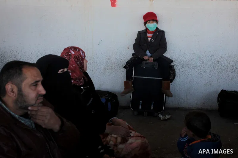 Palestinians hoping to cross into Egypt wait at the Rafah crossing between Egypt and the southern Gaza Strip March 31, 2014. Egyptian authorities partially reopened Rafah border crossing, Gaza's main window to the world,...