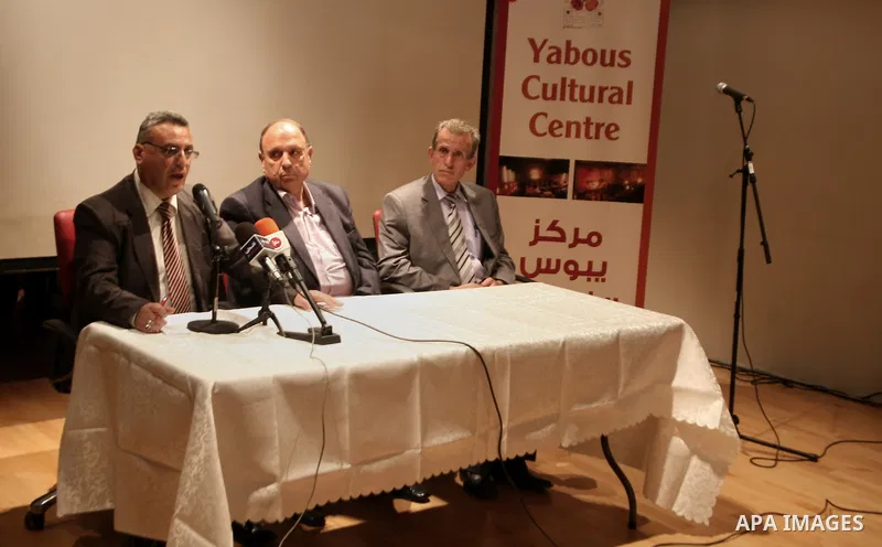 Palestinian journalists attend a ceremony to honor the Jerusalem's journalists and to announce the opening of journalists syndicate, in Jerusalem on March 31, 2014. Photo by Saeed Qaq