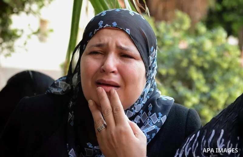 An Egyptian relative reacts during the funeral of Brigadier Tareq al-Margawi, who was killed in a bombing earlier in the day, Cairo, Egypt, 02 April 2014. Brigadier Tareq al-Margawi, the chief of a police investigation d...