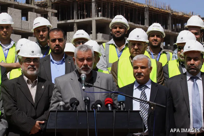 Palestinian Prime Minister in Gaza Strip Ismail Haniyeh, visits the construction site of Hamad City, in Khan Younis in the southern Gaza Strip, April 16, 2014. Qatar funds several large economic projects in Gaza Strip ru...