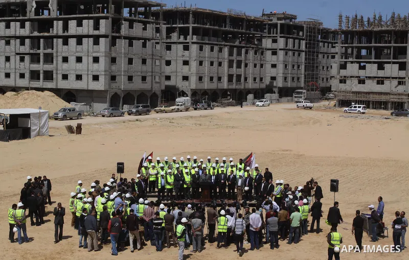 Palestinian Prime Minister in Gaza Strip Ismail Haniyeh, visits the construction site of Hamad City, in Khan Younis in the southern Gaza Strip, April 16, 2014. Qatar funds several large economic projects in Gaza Strip ru...