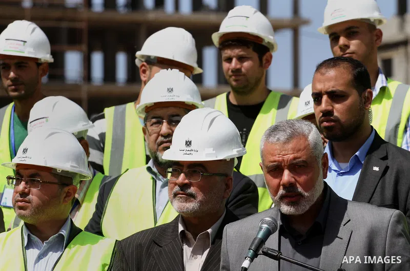Palestinian Prime Minister in Gaza Strip Ismail Haniyeh, visits the construction site of Hamad City, in Khan Younis in the southern Gaza Strip, April 16, 2014. Qatar funds several large economic projects in Gaza Strip ru...