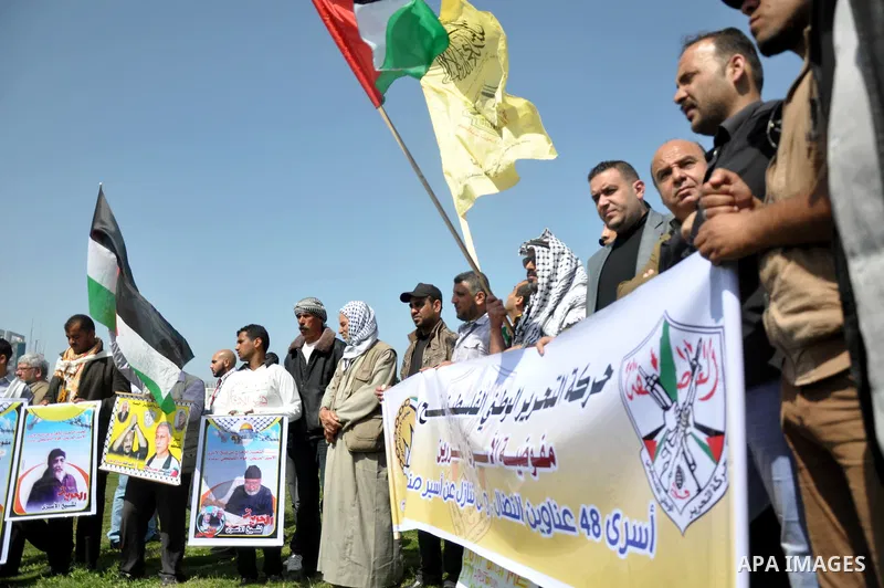 Palestinians take part in a rally marking Palestinian Prisoner Day, in Gaza City April 17, 2014. Israel holds some 5,000 Palestinians it accuses of committing or planning violence against it. Photo by Mohammed Talatene