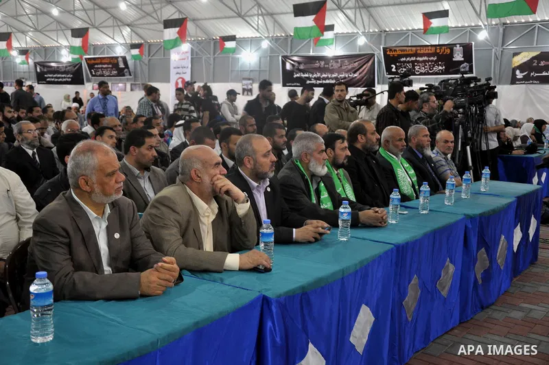 Palestinians participat in an exhibition during a rally marking Palestinian Prisoner Day, in Gaza City April 17, 2014. Israel holds some 5,000 Palestinians it accuses of committing or planning violence against it. Photo...