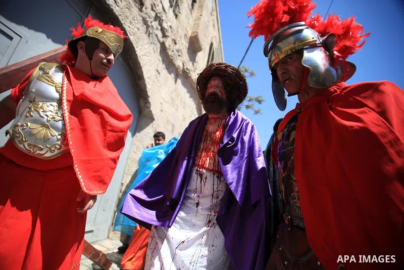 Christian Orthodox pilgrims participate in a procession marking Good Friday on April 18, 2014 in Jerusalem's old city. Thousands of Christian pilgrims take part in processions along the route where, according to traditio...