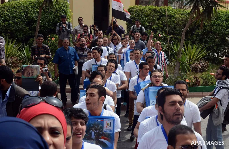Egyptian presidential hopeful Hamdeen Sabahy waves to supporters as he arrives to formally submit the documents required for his presidential candidacy to Egyptian presidential elections commission, in Cairo, Egypt, 19 A...